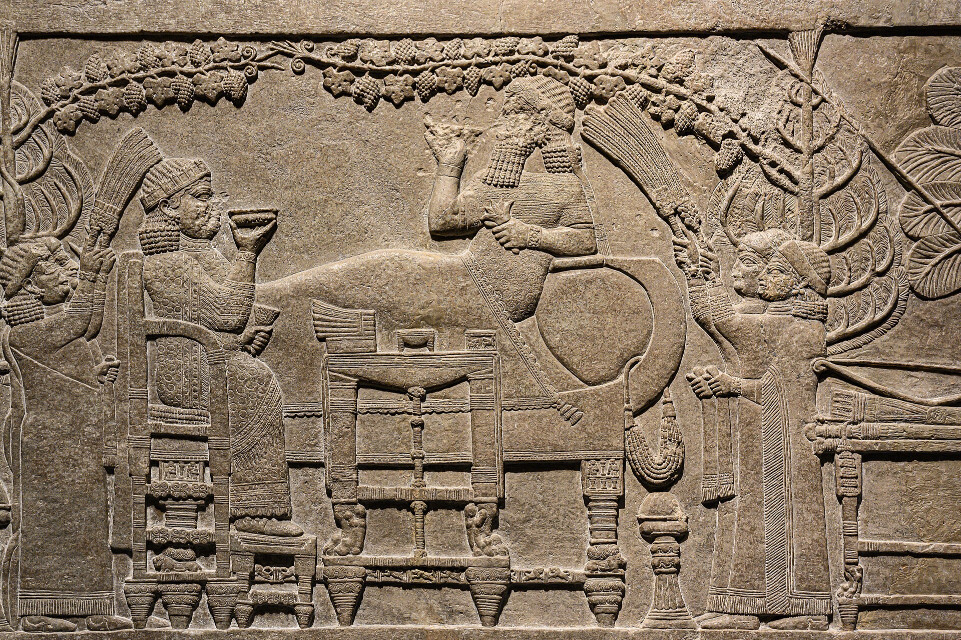 Assyrian Relief of the Banquet of Ashurbanipal From Nineveh Gypsum N Palace British Museum 03.jpg